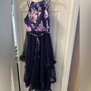 Beautiful dress. Purple dress ruffles & tulle. New w/out tags. Size 16 girls